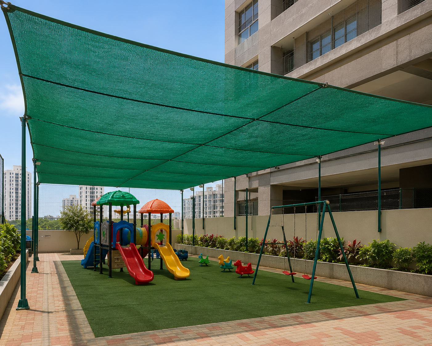 Commercial parking shade net in Derebail Mangalore — large scale HDPE shade cloth on heavy GI pipe frame structure over outdoor parking area